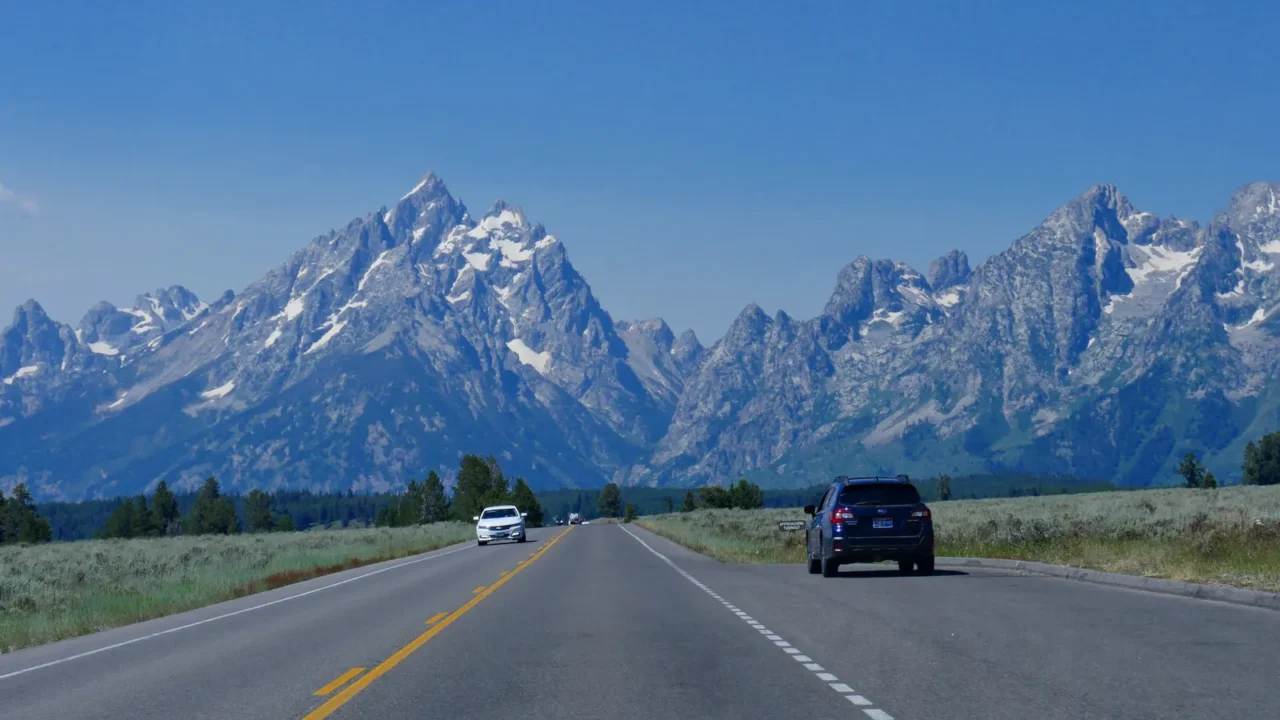 wyoming usa july 2018 paved road with the impressive grand