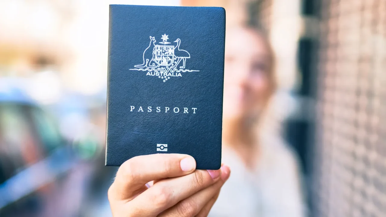 young beautiful blonde caucasian woman smiling happy outdoors on a