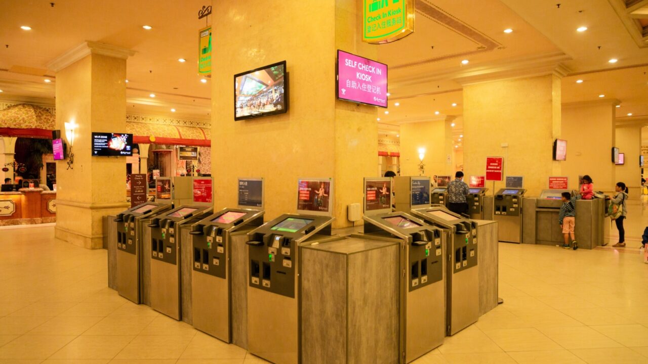 Genting , Malaysia - Mar 1, 2019 : close up many kiosks , tourist check in by kiosk in first world resort at genting highland in Malaysia .