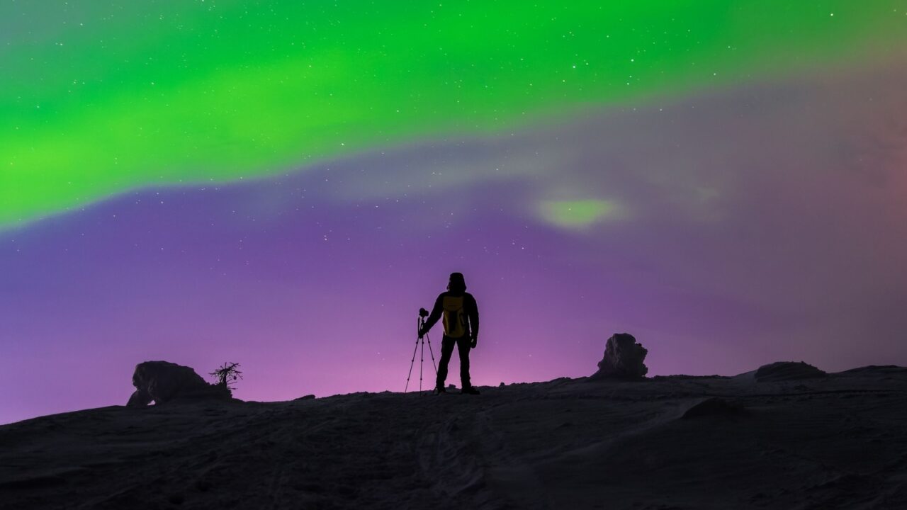 "The Photographer" Northern lights (Aurora Borealis) in Khibiny Mountains, Murmansk region, Russia, Far North, Polar Night