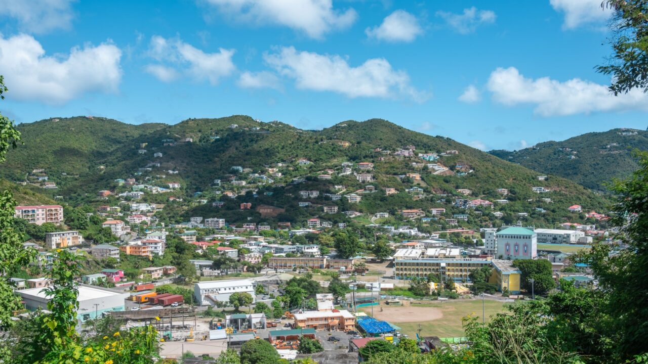 Aerial view of port city of Road Town, Tortola, capital of the British Virgin Islands, blending lush hills and vibrant Caribbean island life, culture, commerce, and stunning scenery (February 2025)