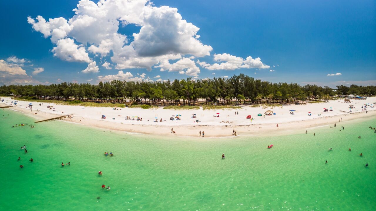 A panoramic summer photo of Coquina Beach in Bradenton Beach, Anna Maria Island, Florida. A great photo of a Florida beach!