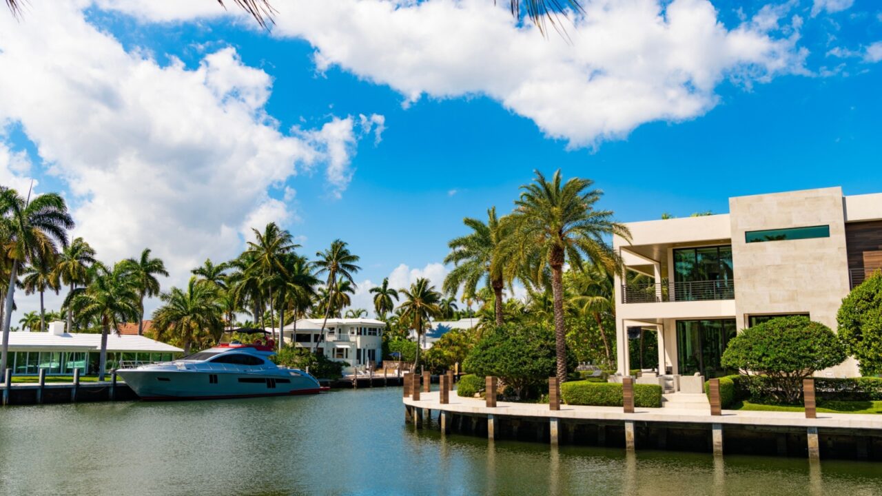 Enjoying summer vacation on boat in the sea with villa. Summer vacation with a speed boat yacht. Summer vacation. Yacht boat. Summer holidays on luxury yacht. Summertime retreat