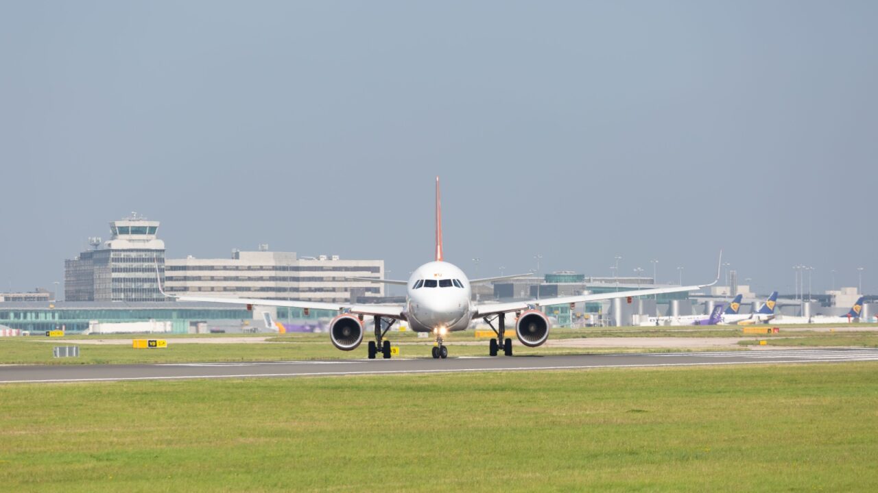 MANCHESTER AIRPORT - AUGUST 26th 2019: Front view of Easyjet Airbus A320-214 just starting to take off at Manchester Airport, UK AUGUST 26th, 2019