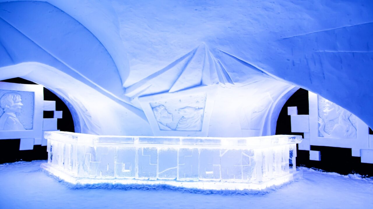 Excursion and tourist center "Snow Village". Large structure made of snow and ice. Kirovsk, Murmansk region, Russia - February 5, 2025.