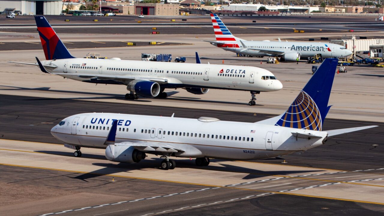 Phoenix, AZ - December 1, 2023: Photo of United, Delta, and American Airlines passenger planes at Phoenix Sky Harbor International Airport (PHX)
