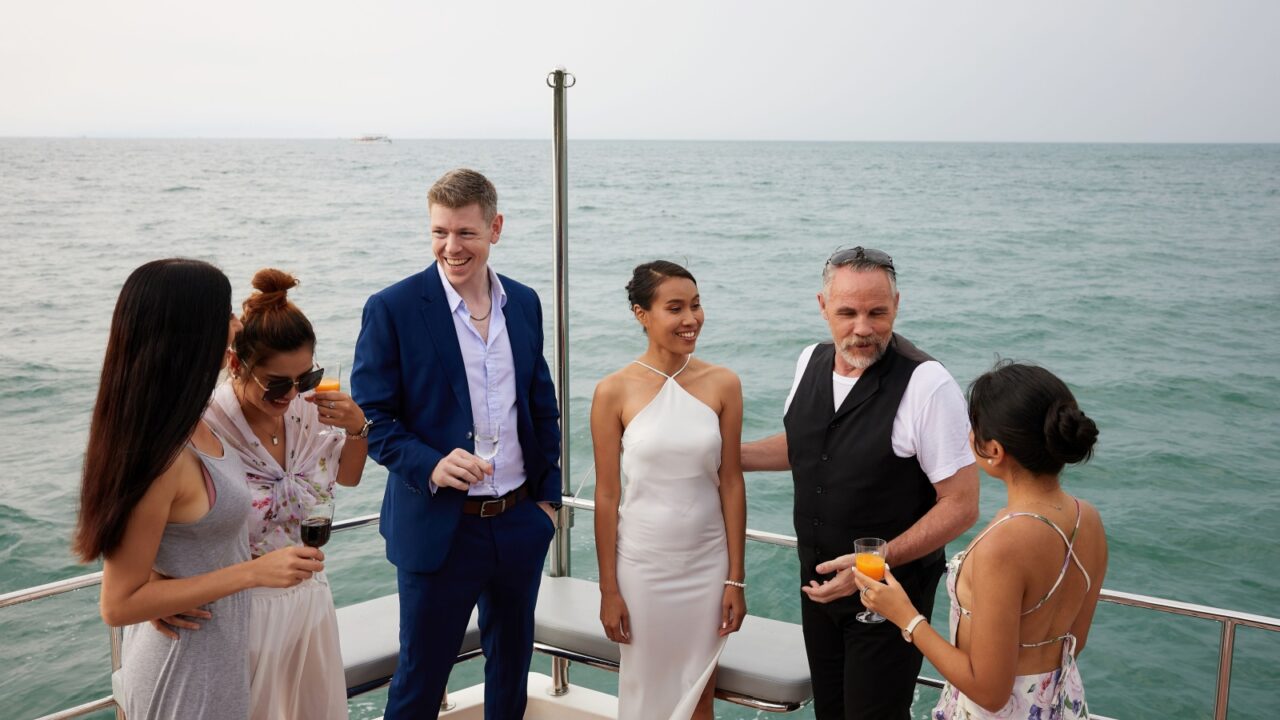 group of friends having fun and party celebrating on luxury yacht