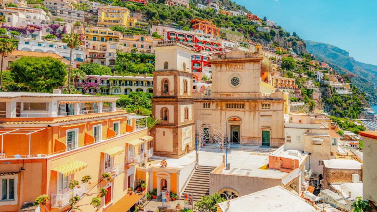 Positano coastline in south of Italy, vertiginous cliffs adorned with colorful villages, turquoise waters. Small town Positano on Amalfi Coast near Neapol, Italy