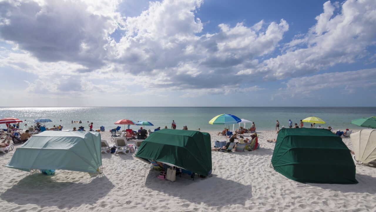 NAPLES, FLORIDA, USA - NOVEMBER 6, 2016: The warm southern Florida climate makes Vanderbilt Beach a popular destination year round.
