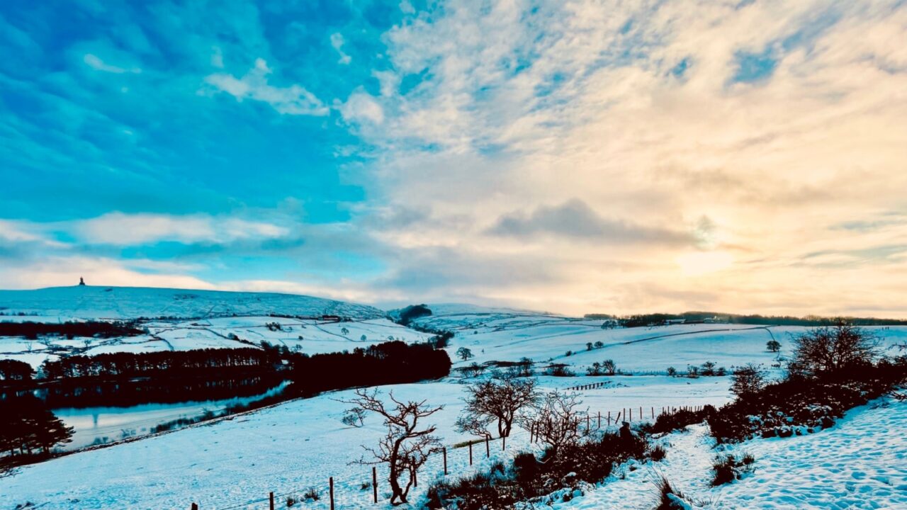 North West England snow scene in Winter with a dramatic sky