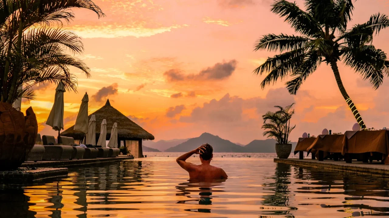 a young man enjoys a tranquil moment by a luxury