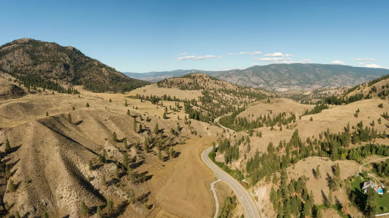 aerial view of a scenic road in the dry canadian