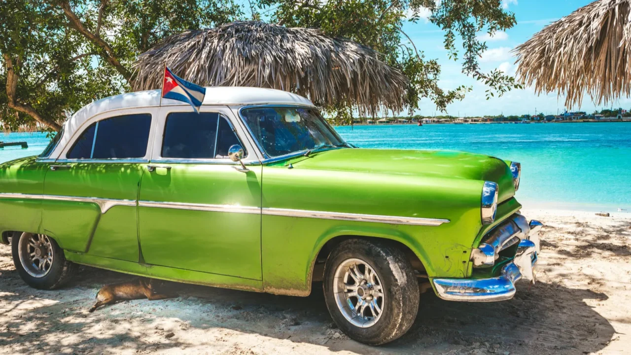 american classic car on the beach playa la herradura province