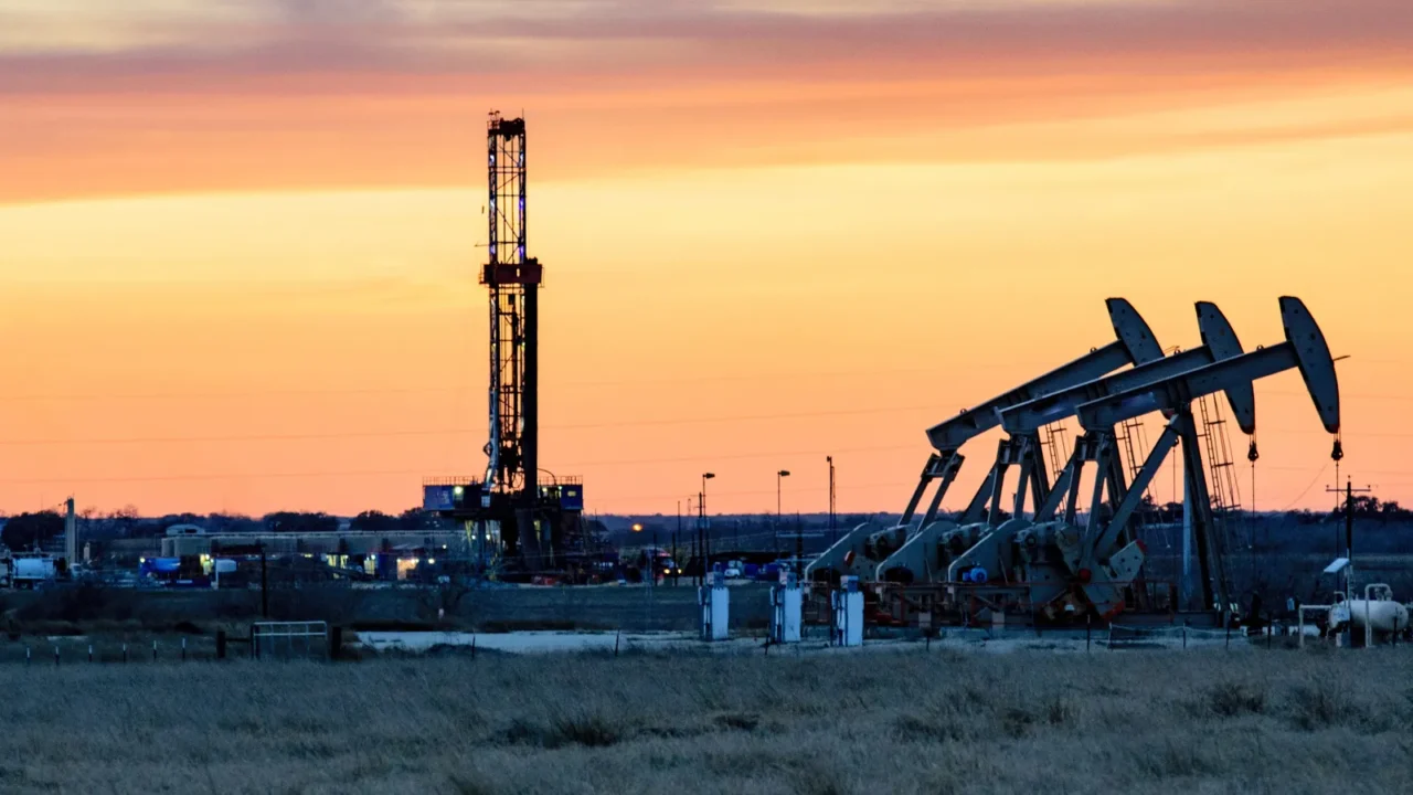 american drilling rig at sunset