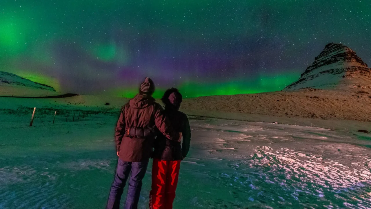 beautiful northern lights with kirkjufell on the background iceland