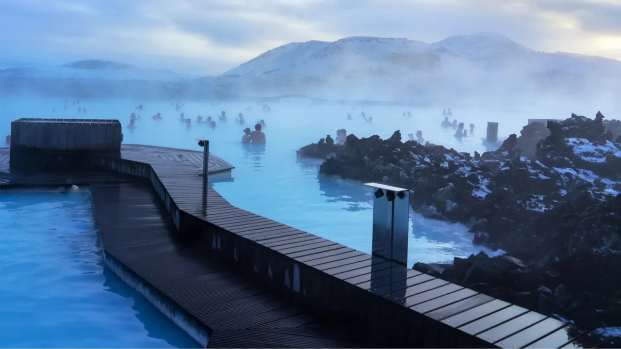 blue lagoon next to reykjavik with people bathing in this