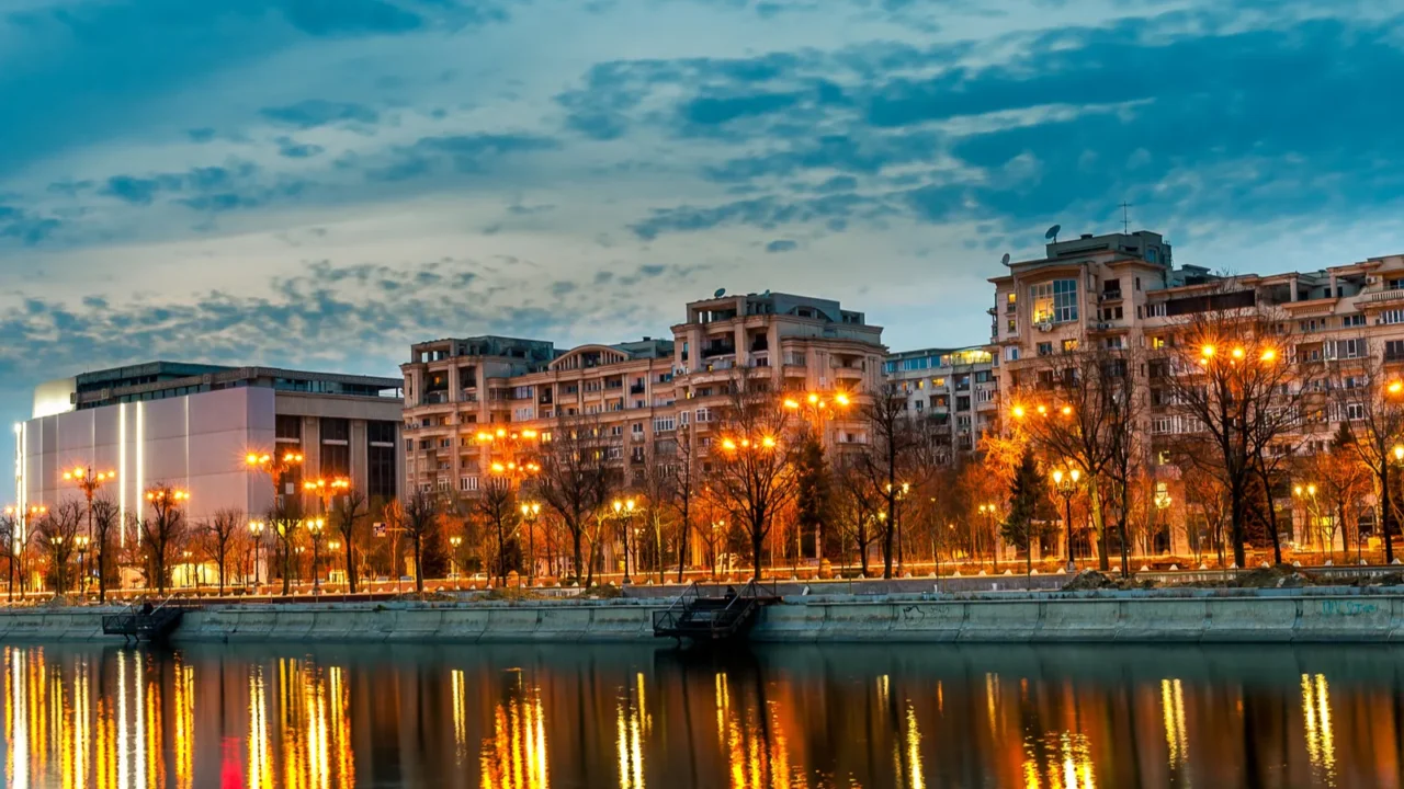 bucharest city center splaiul unirii at dusk dambovita river