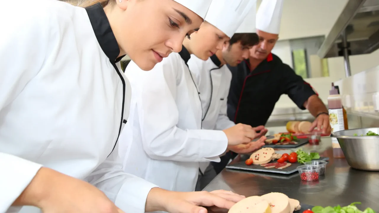 chefs preparing delicatessen dishes