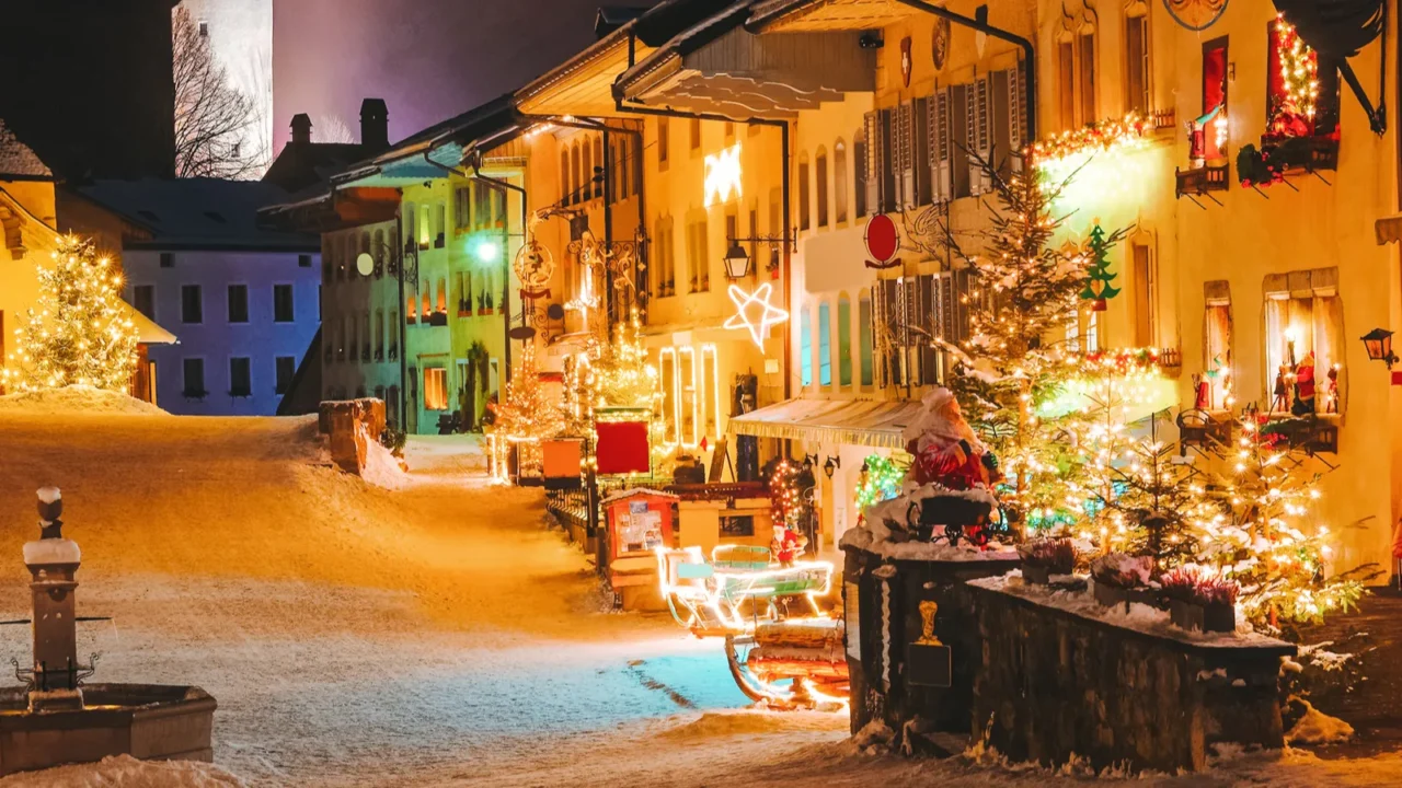 christmas gruyeres town village in switzerland in winter at night