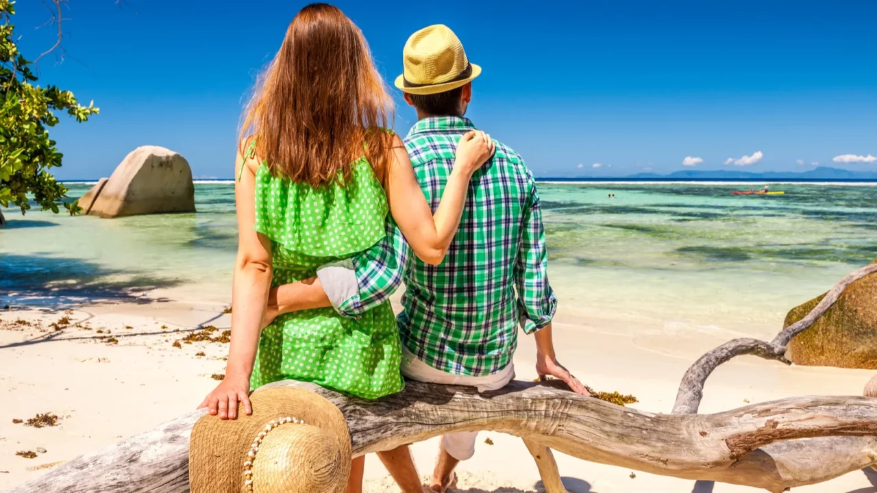 couple on a beach at seychelles