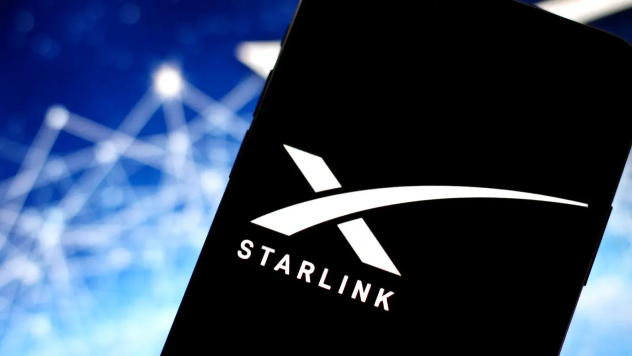in this photo illustration the starlink logo is displayed on