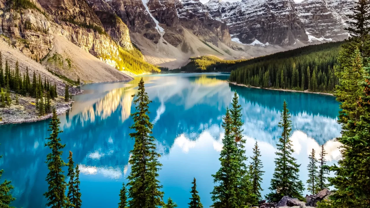landscape sunset view of morain lake and mountain range