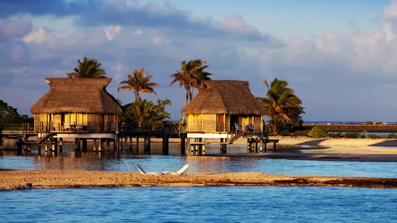 lodges over transparent quiet sea water tropical paradise maldives