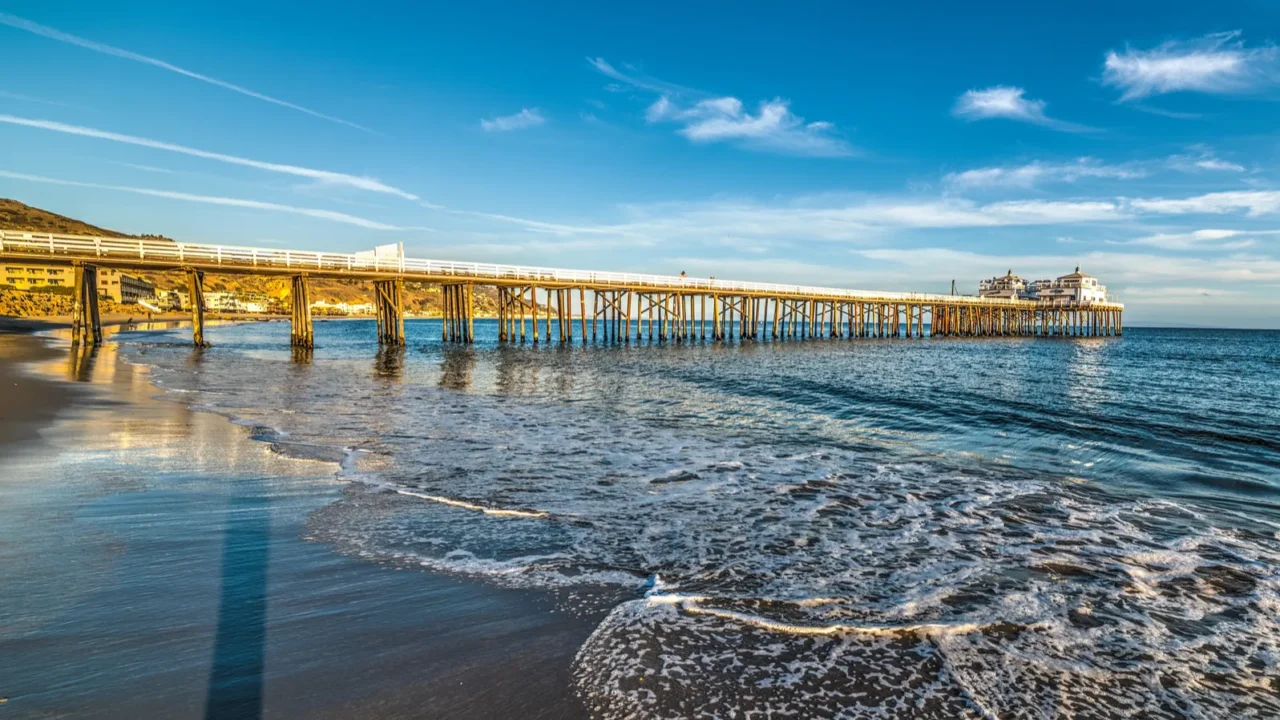 malibu pier on a clear day at sunset