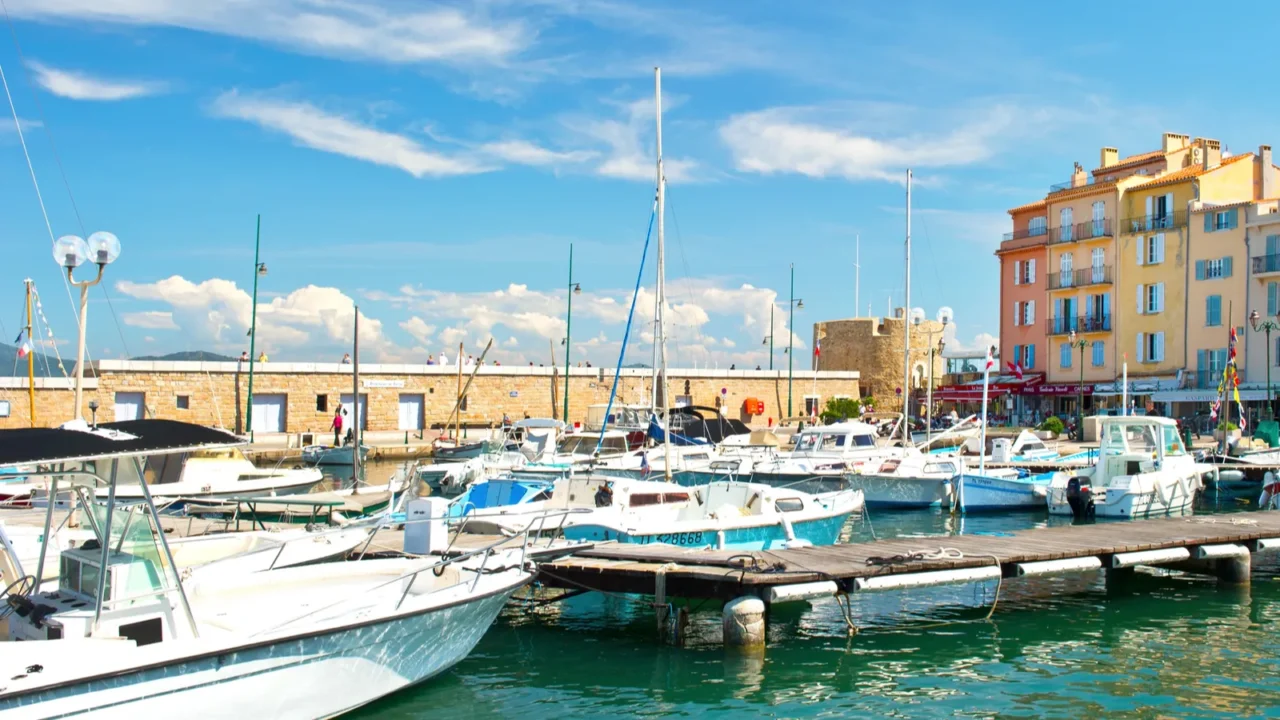 mediterranean landscape with boats and old buildings