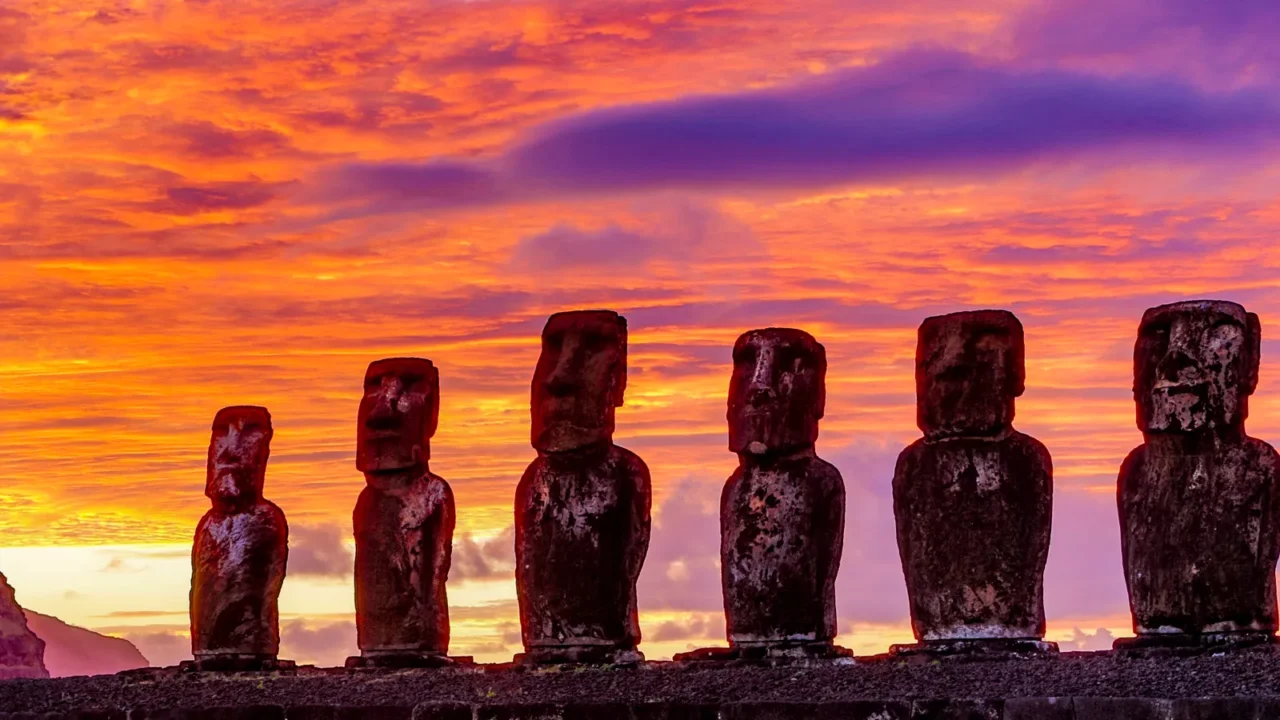 moai on easter island at ahu tongariki at sunrise