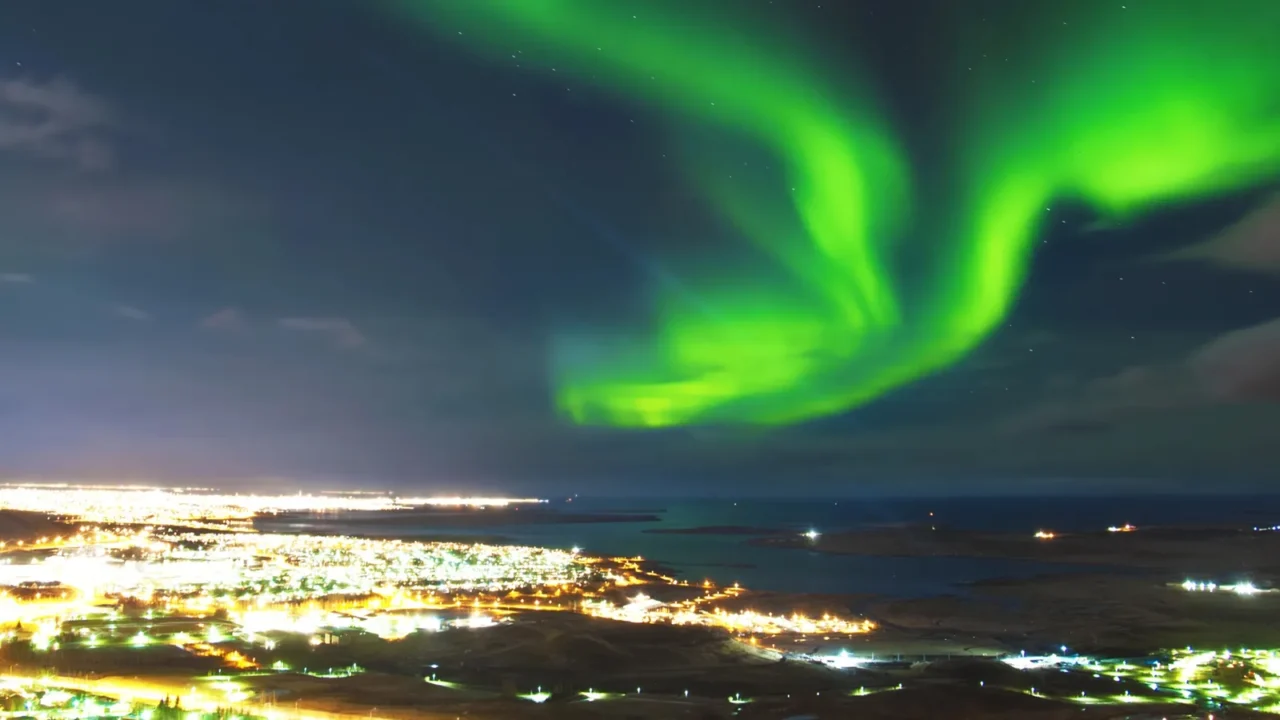 northern lights above reykjavik iceland
