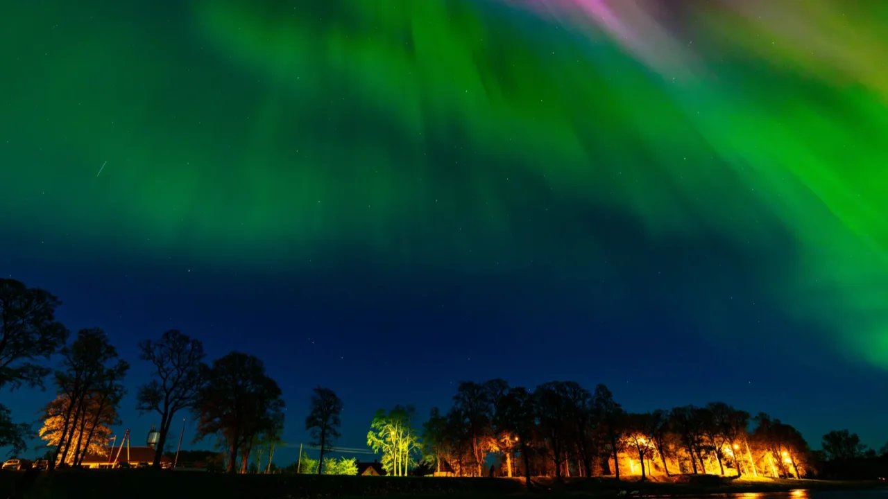northern lights over lake burtnieks aurora borealis or northern lights