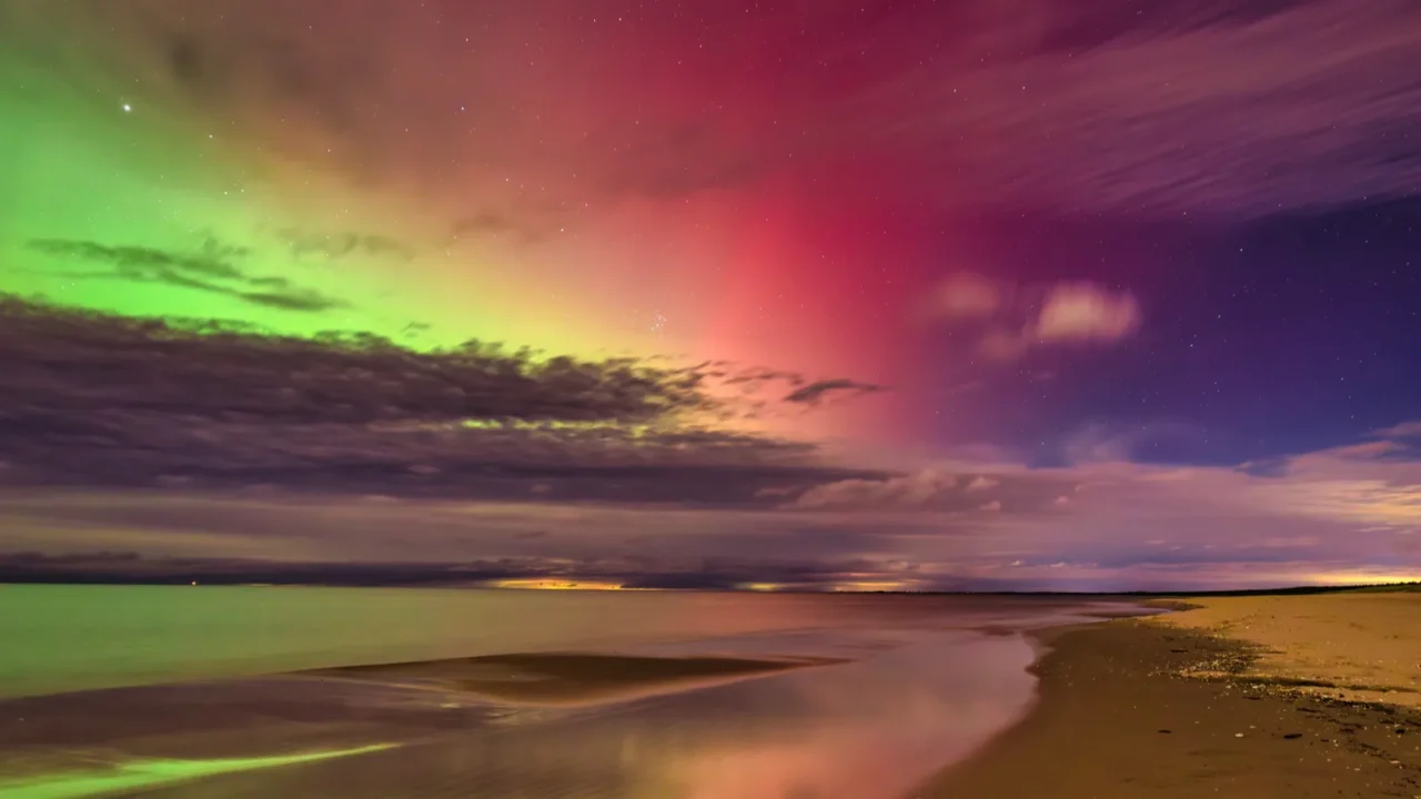 northern lights over the baltic sea beach by the sobieszewo