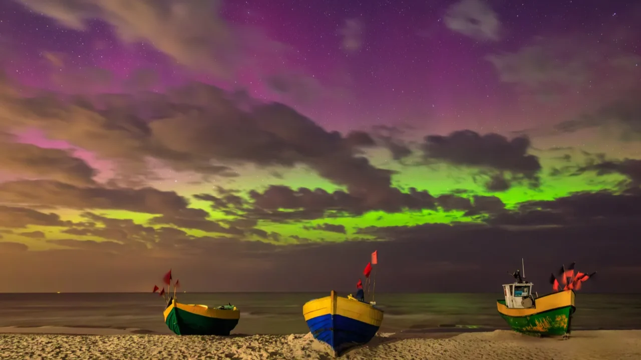 northern lights over the baltic sea on the beach in