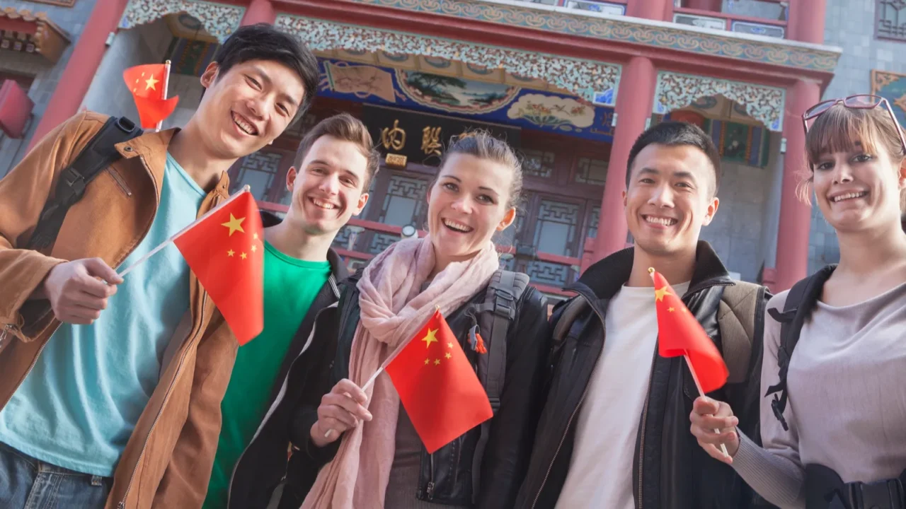 people holding chinese flags