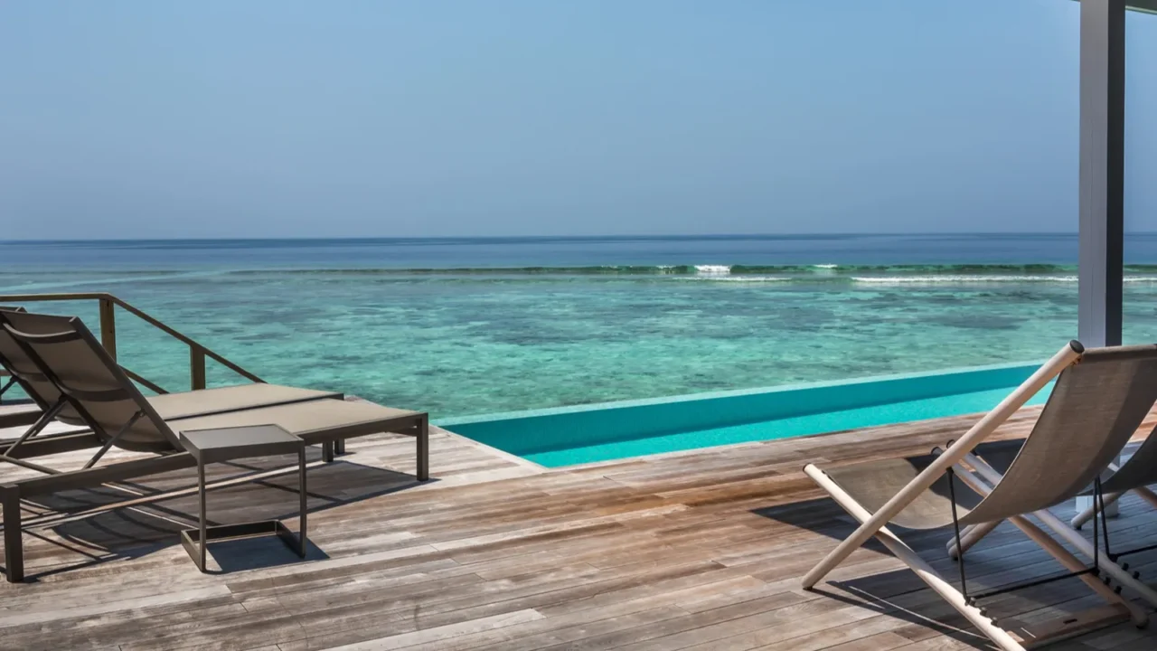 private swimming pool and terrace of water villa in maldives