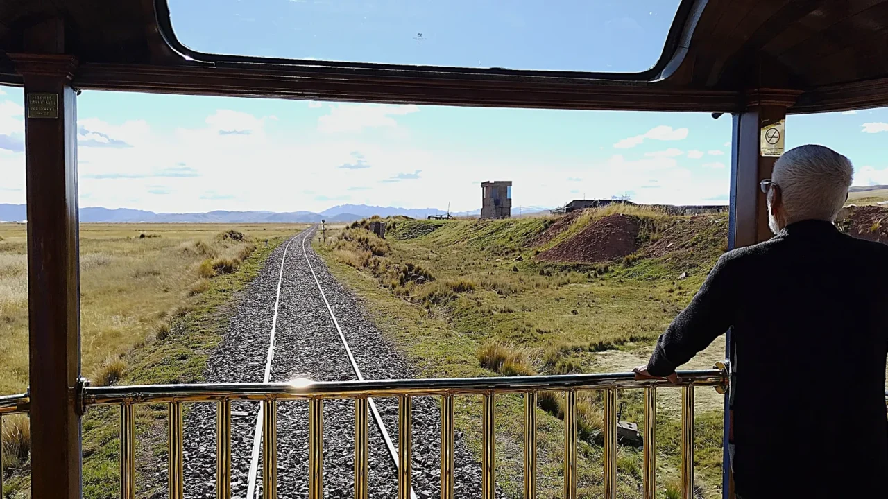 puno peru may 28 2025 elderly male passenger enjoys