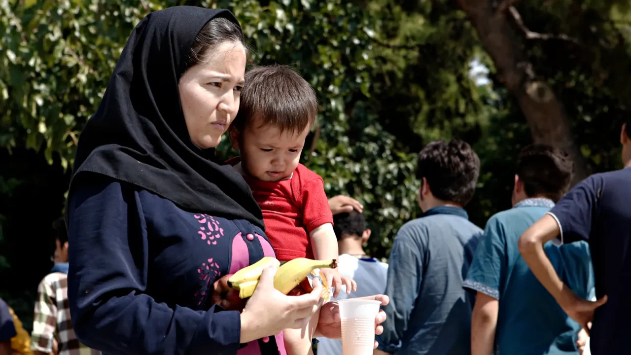 refugees and migrants in a makeshift camp at pedion tou
