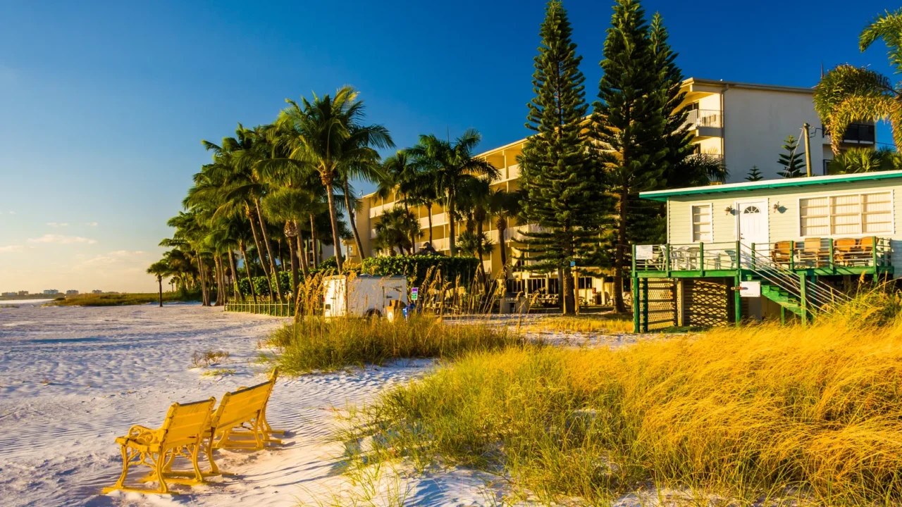 sand dunes and buildings on the beach in fort myers