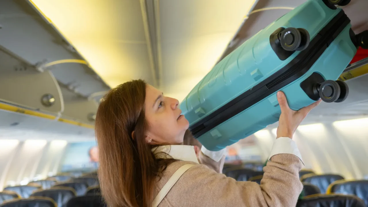 side view of young female in casual outfit with backpack