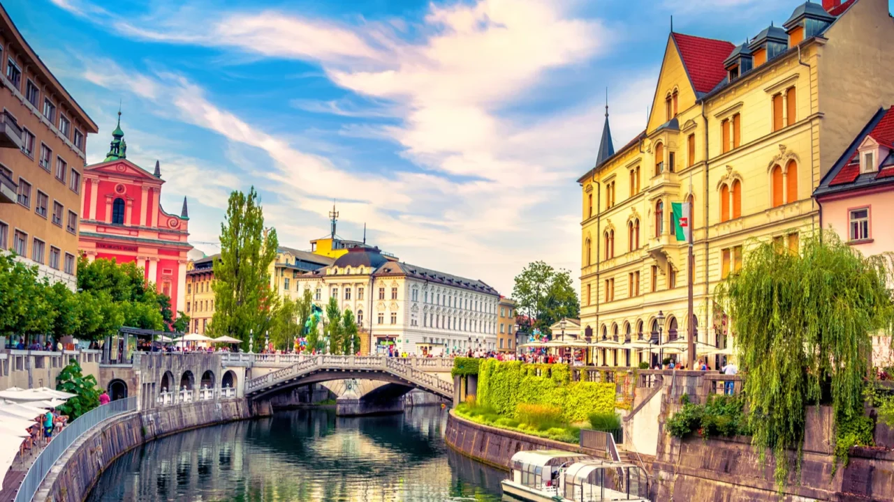 slovenia ljubljana tromostovje ljublianica river church