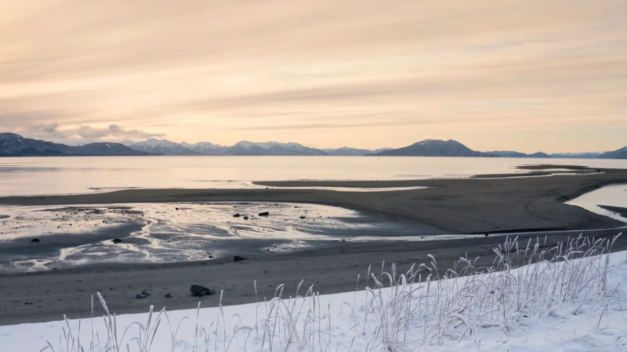 snowy beach at sunset