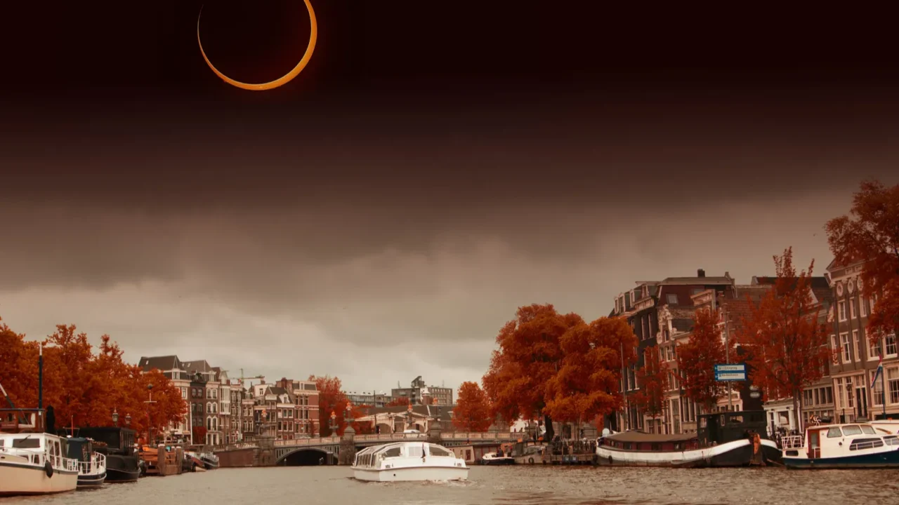 solar eclipse over the city amsterdam elements of this image
