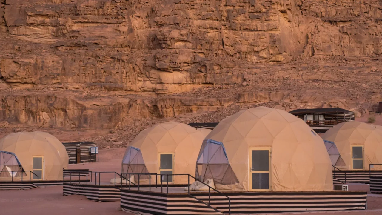 stars above martian dome tents in wadi rum desert jordan