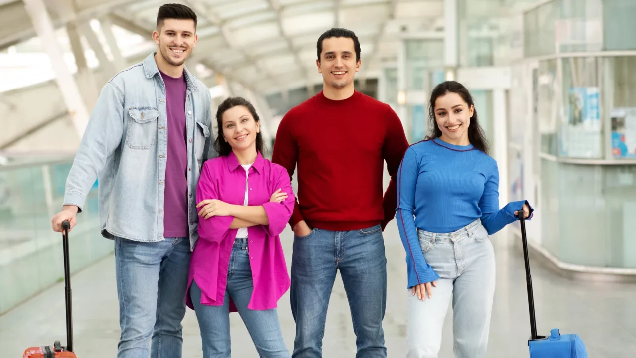 suitcase squad two happy couples friends hugging posing with their