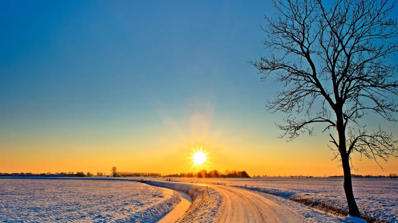 sunset in a white winter landscape
