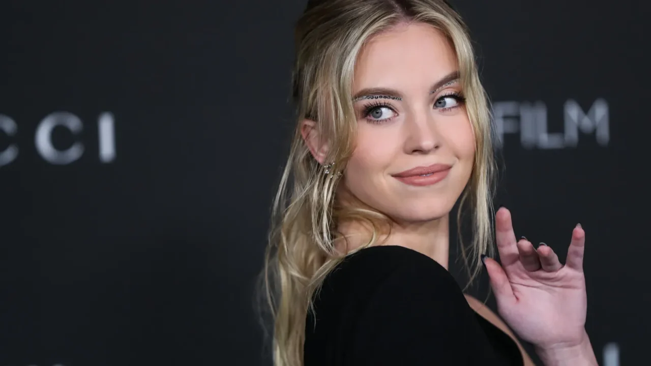 sydney sweeney wearing a saint laurent dress arrives at the