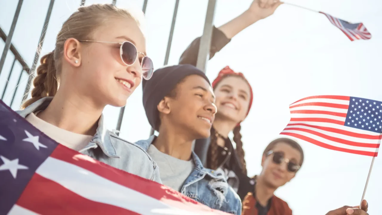 teenagers with american flags