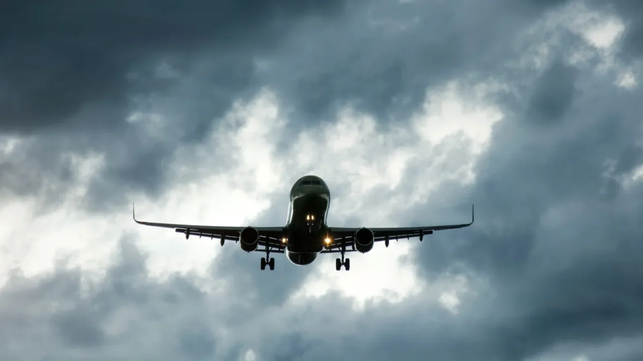 the heavy storm is approaching the airport in cloudy weather