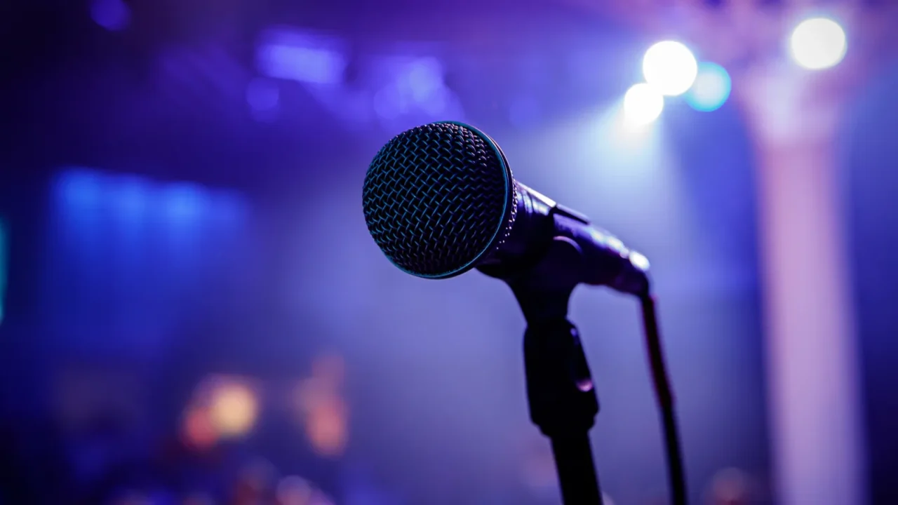 the microphone on stage in a concert hall